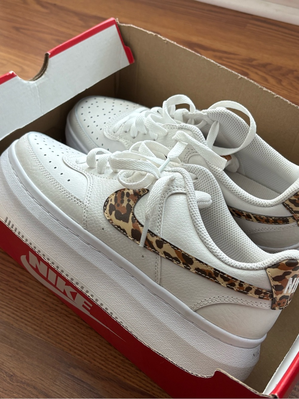 Nike Women's White Sneakers with Leopard Swoosh - Picture 1 of 3